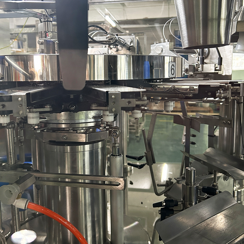 آلة التعبئة الآلية المادة اللزجة المسمار متعدد الرؤوس الوزن آلة التعبئة المجمّدة العصي الدجاجية آلة تعبئة النقود